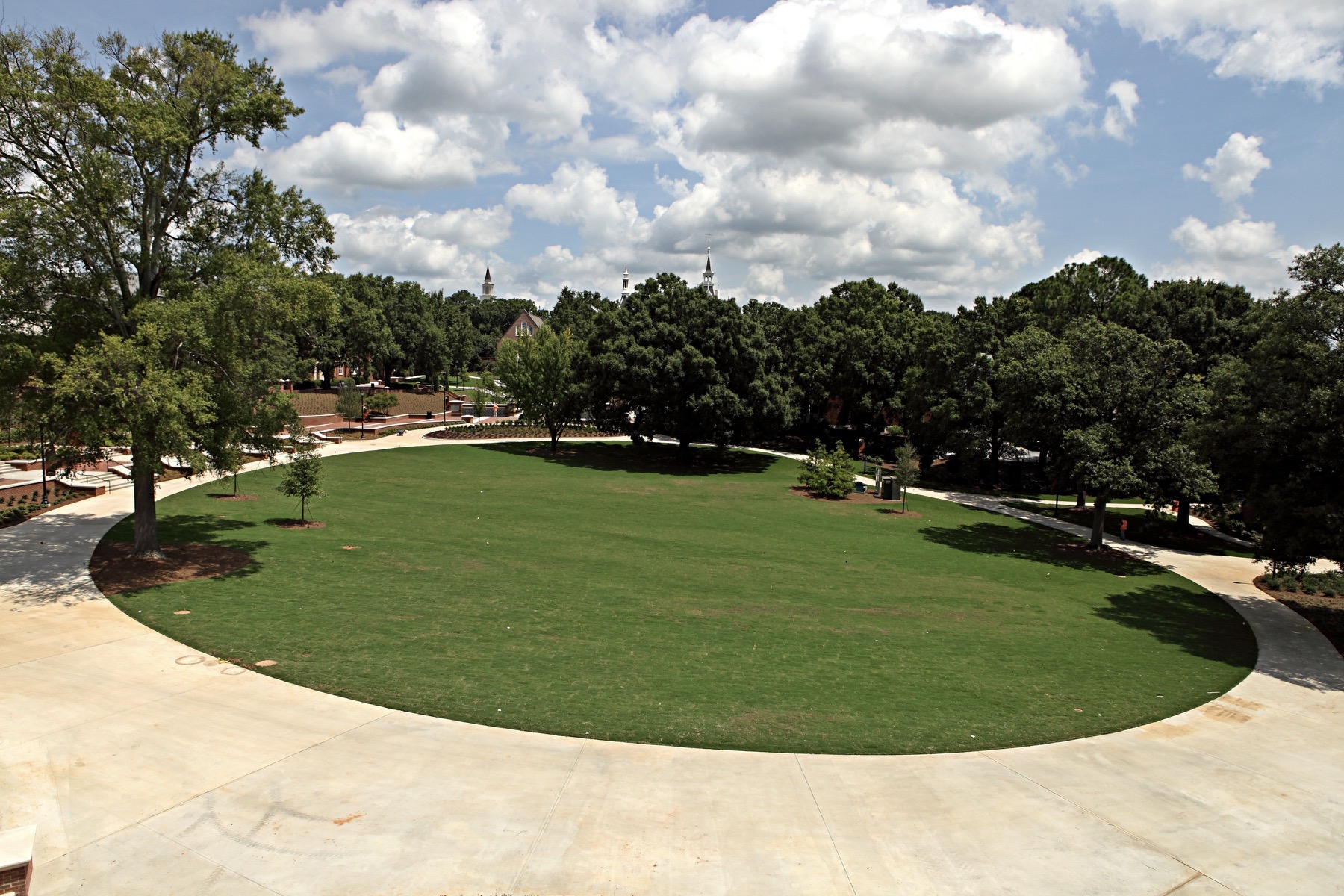 Circular green space surrounded by a sidewalk