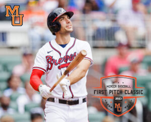 Braves baseball player Matt Olson swings a bat