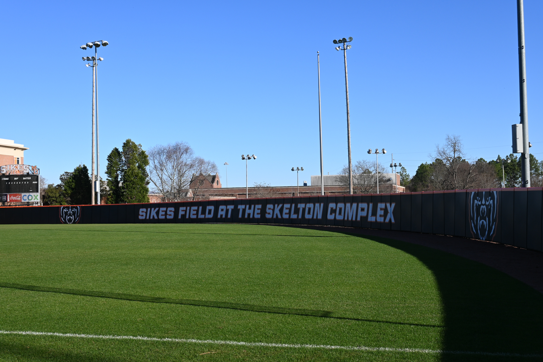 outfield. wall says sikes field at the skelton complex
