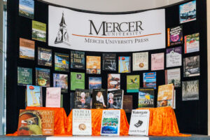 trifold board features book covers on it