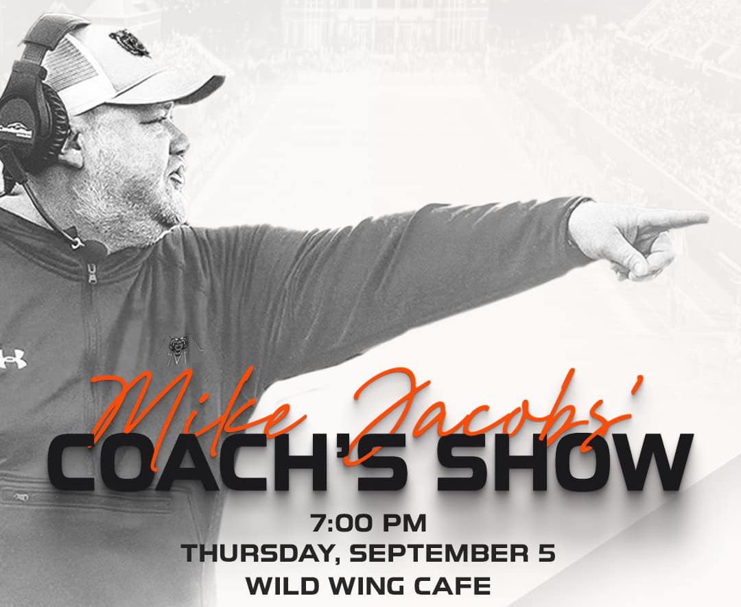 Black and white image of a football coach pointing, with the words "Mike Jacobs' Coach's Show" overlaying the photo.