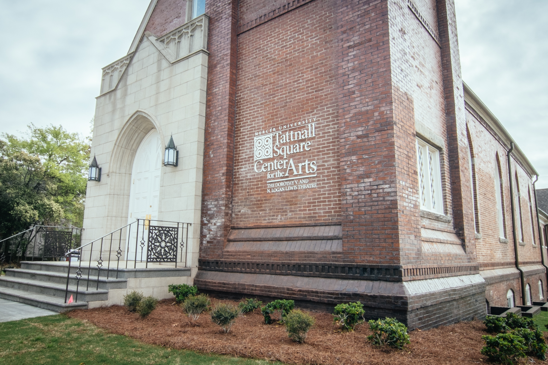 Exterior of Tattnall Square Center for the Arts, a brick building resembling a church.