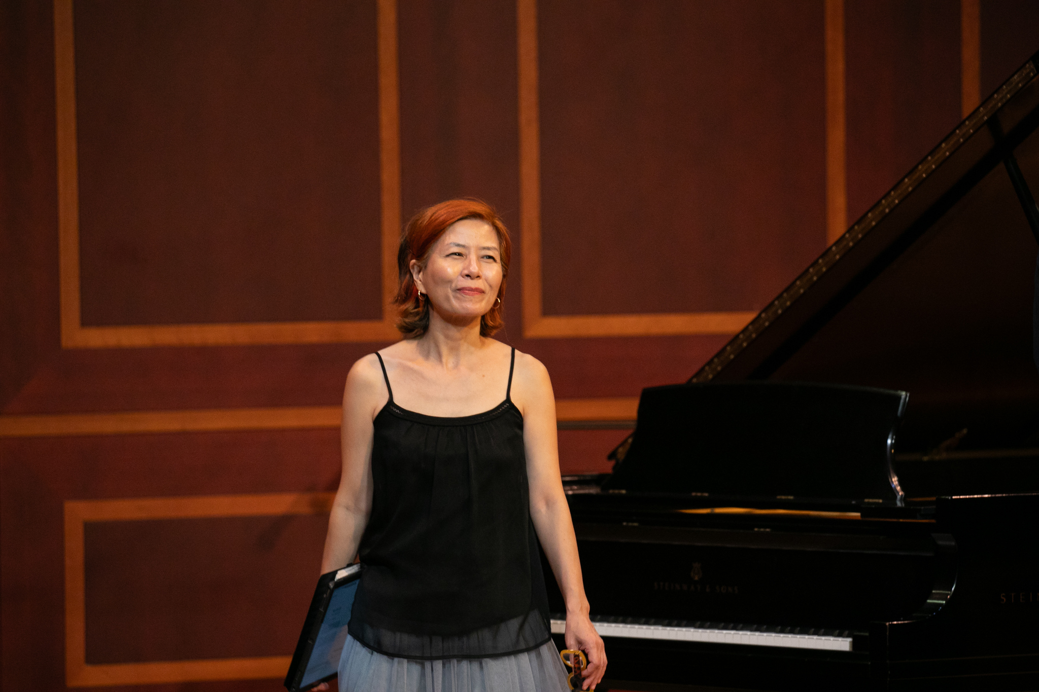 Kyung-A Yoo in a concert hall.