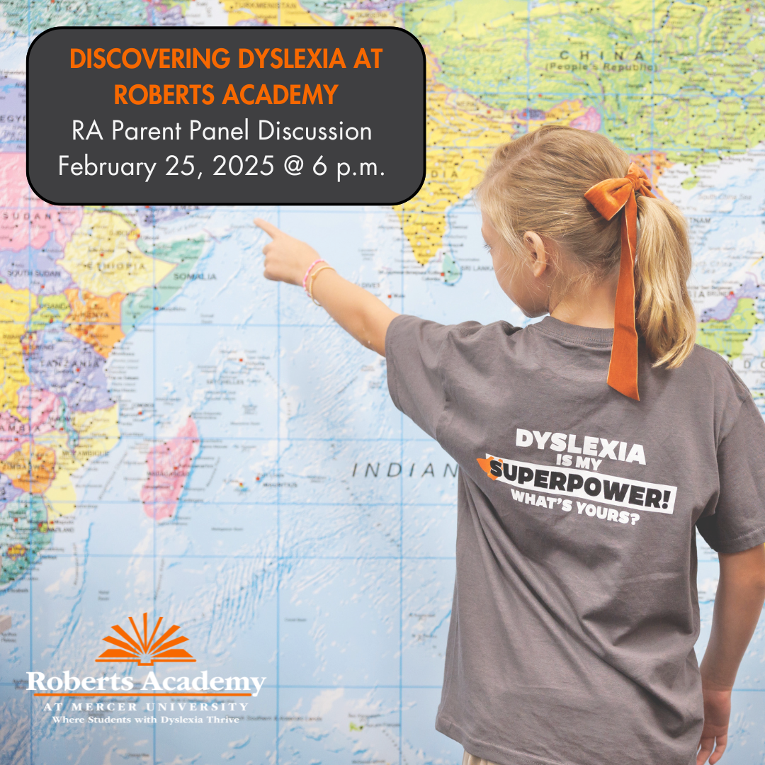 A child wearing a T-shirt that reads "Dyslexia Is My Superpower! What's Yours?" is pointing at a world map.