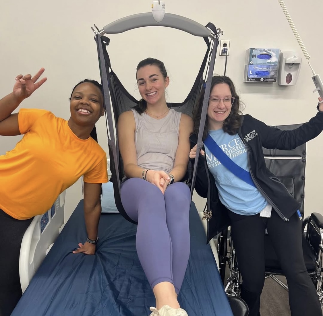 Three physical therapy students