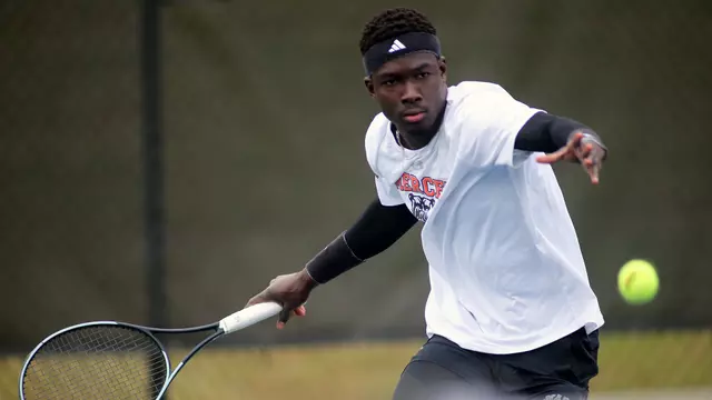 Mercer men's tennis player during a match.