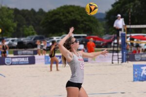 A beach volleyball player during a match.
