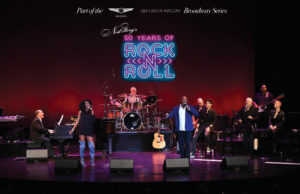 Band performs on stage.