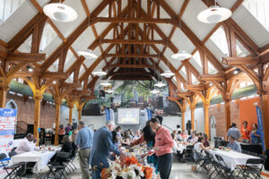 People getting food at a luncheon.