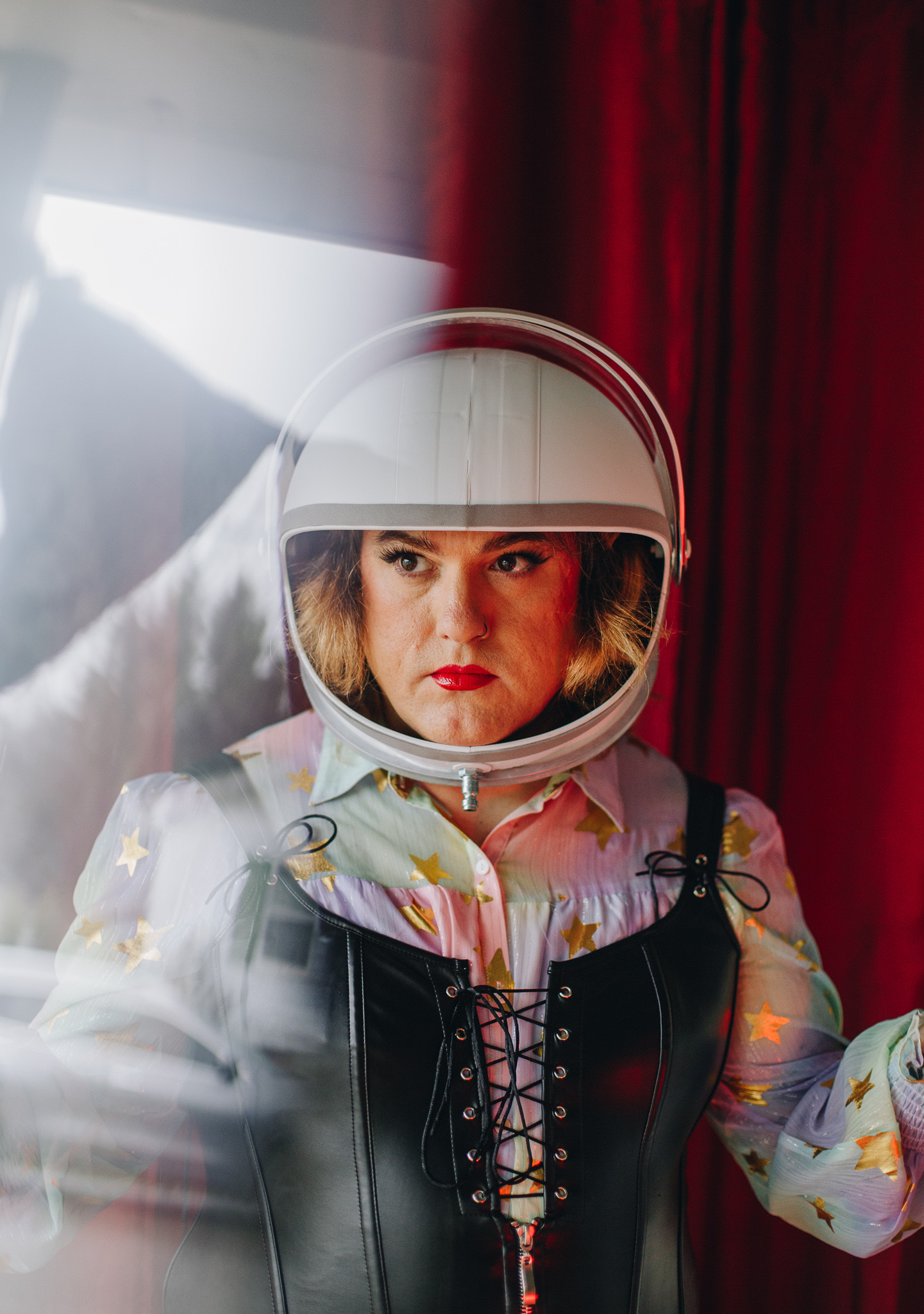 Adeem the Artist wearing an astronaut helmet.