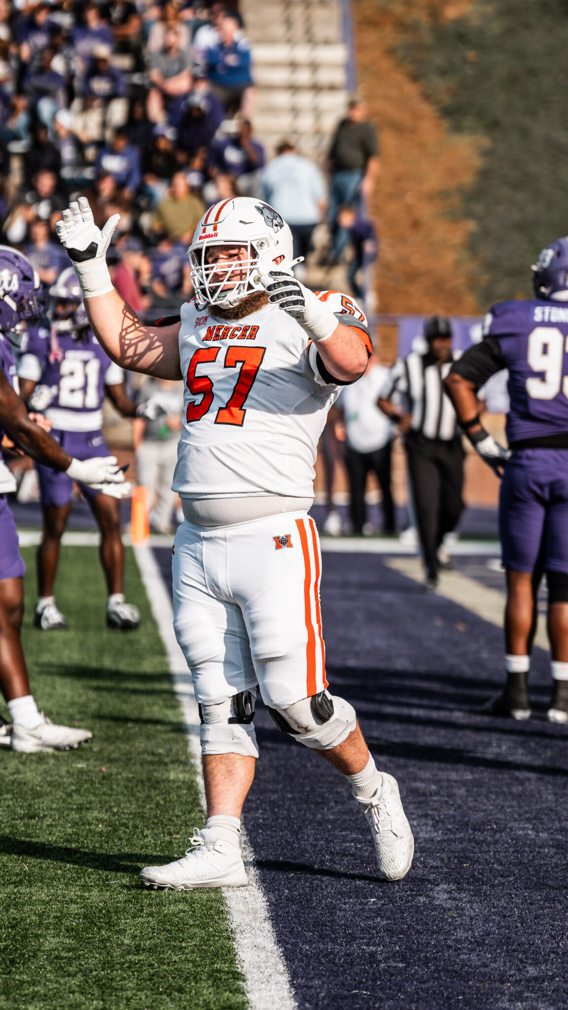 Mercer football player #57 on the field.