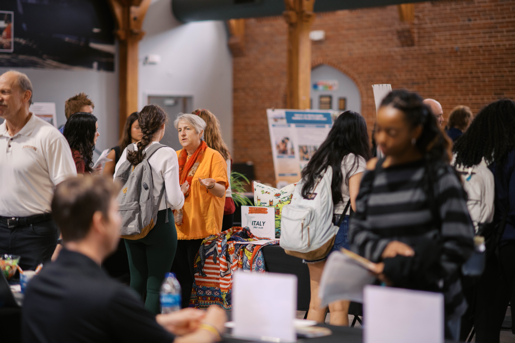 Mercer students browse tables at a study abroad fair.